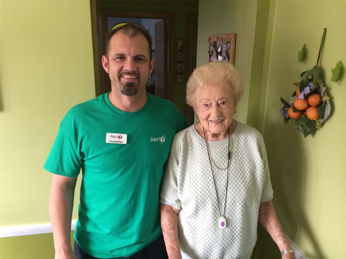 Fall Prevention Medical Alert System Specialist Installer with a Customer